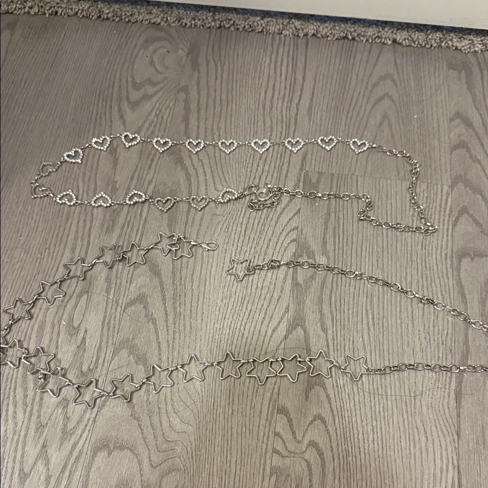 2 silver chain belts